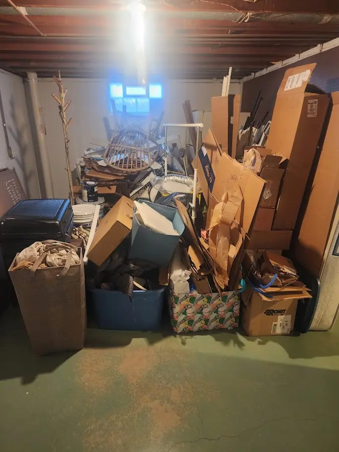 Roll-off dumpster container at job site for Yard Waste Dumpster Rental in Rockland